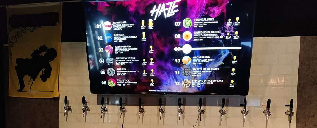 The electronic beer menu at Haze in Bangkok, Thailand. Majority show local craft beer.