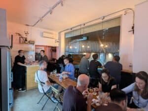 crowd at Duke of Beerington craft beer shop in Bangkok Thailand