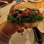 Holding the Fat Cow burger at the Fat Cow Lat Phrao in Bangkok 