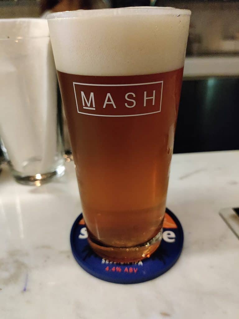 pint of beer with MASH branding from Bangkok Thailand
