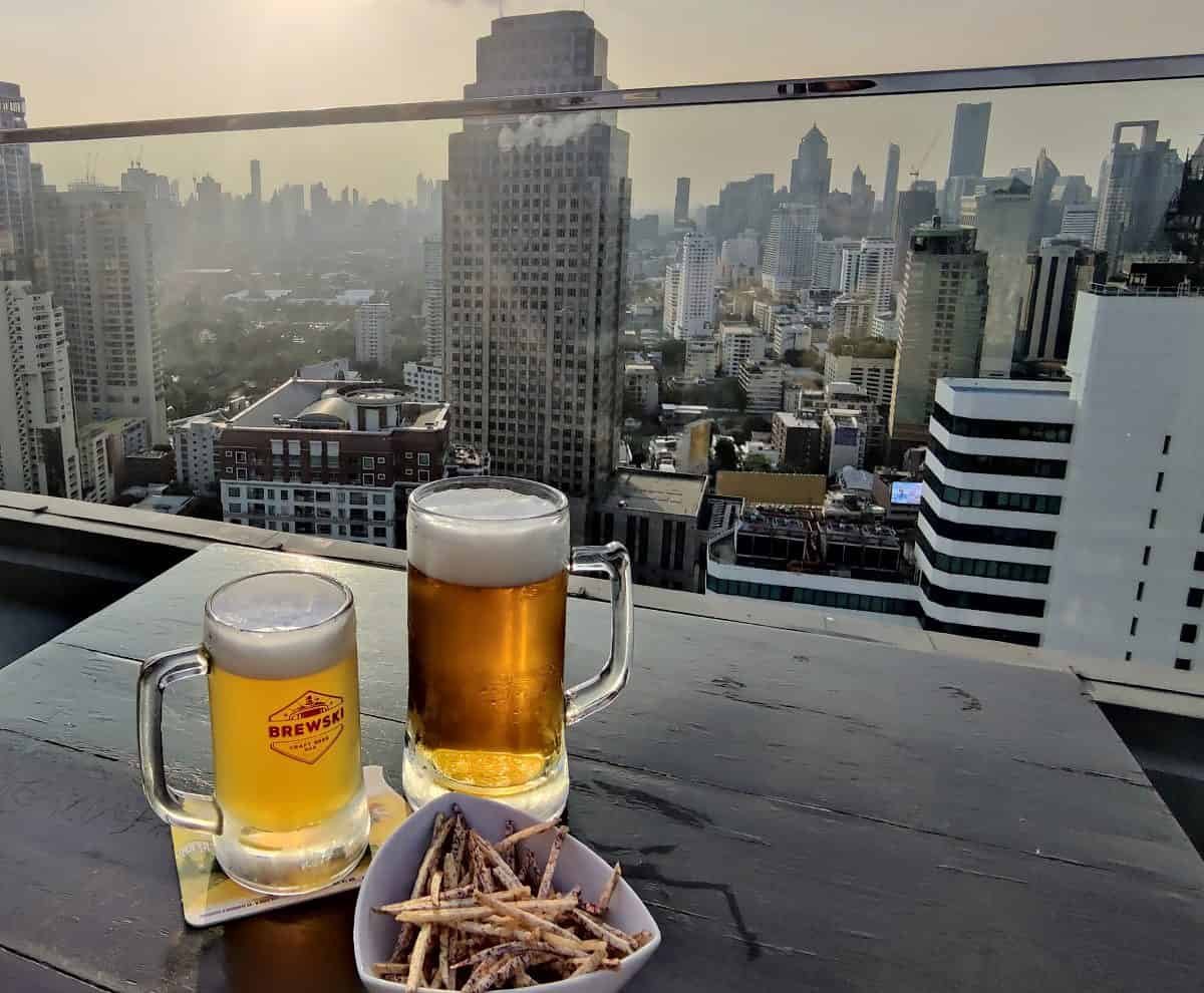 Two pints of beer outside at Brewski craft beer bar in Bangkok Thailand