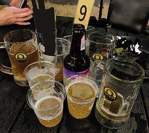 Chit craft beer branded beer mugs and Beervana cups at Chit Hole, by Chit Brewery in Bangkok Thailand