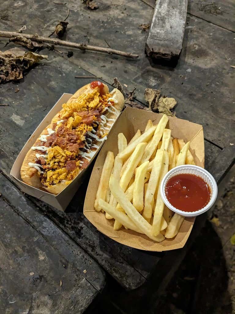 Hot dog and french fries served at Beer Market 2 at Chang Chui Creative Park in Bangkok, Thailand. 
Organized by ประชาชนเบียร์ (Beer People).