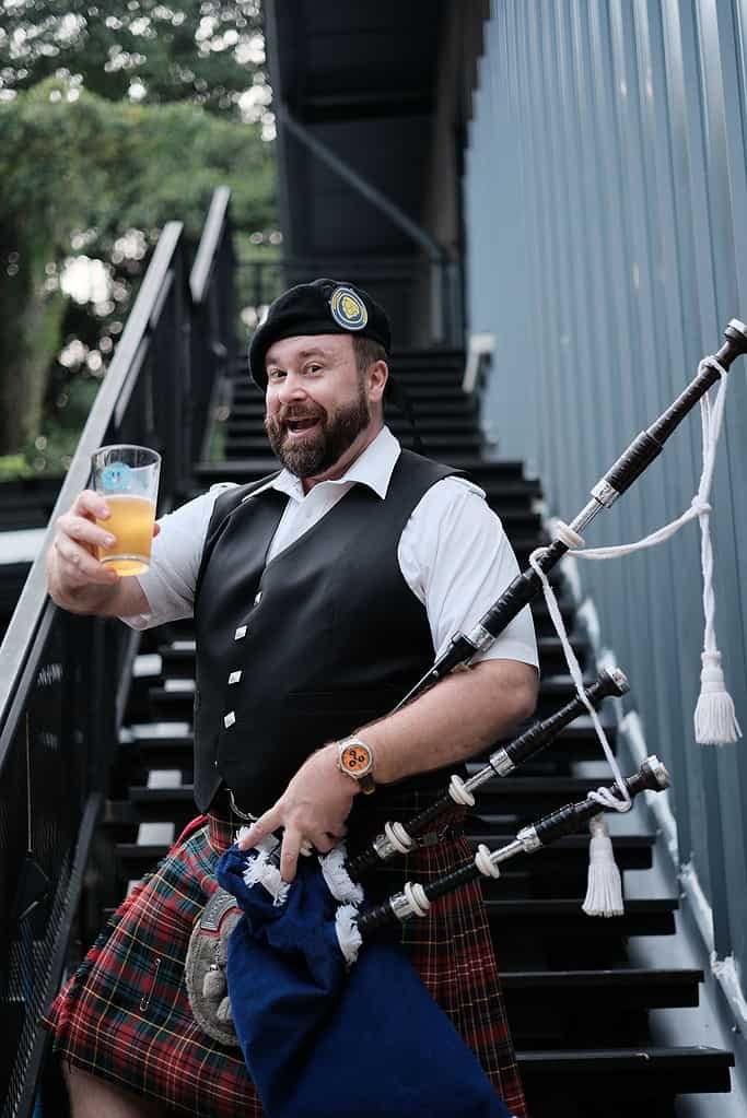 Wigipiper - bagpiper at the Thai Craft Beer Week media event at United People's Brewery in Bangkok Thailand.
