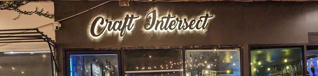 Craft Intersect sign above the door - serving craft beer in Bangkok Thailand