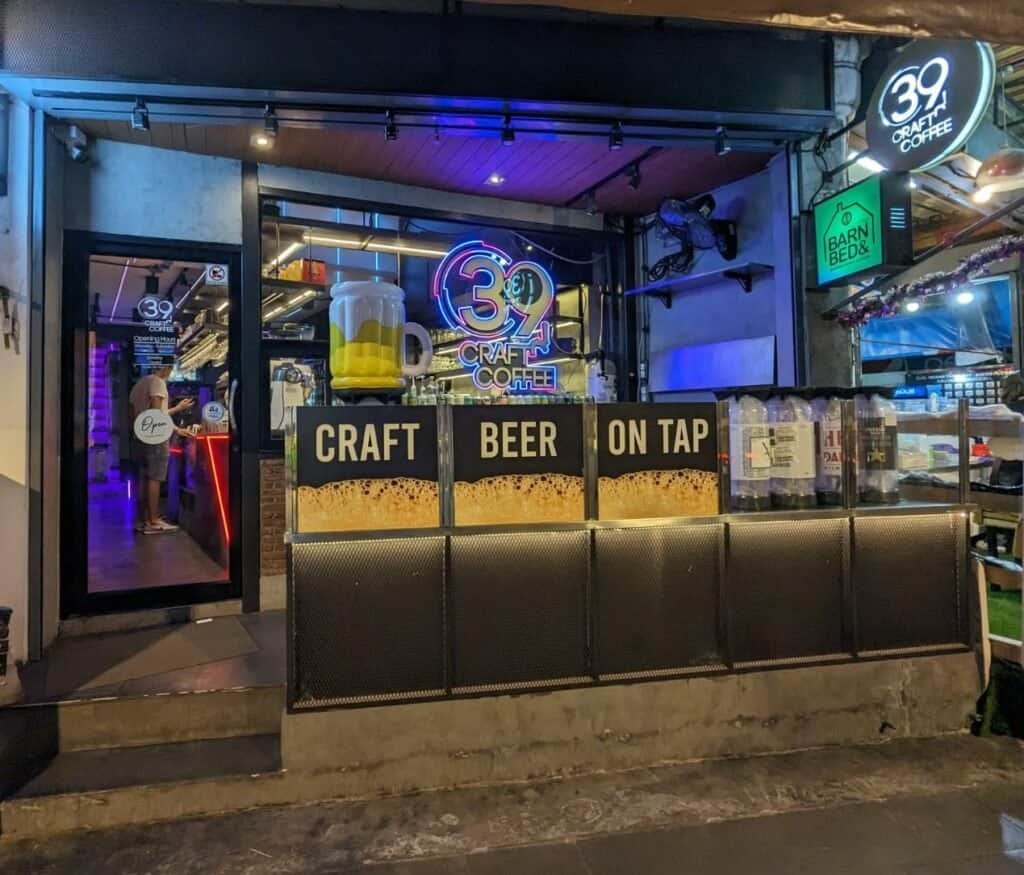 view of 39 Craft Coffee at night from outside - offering craft beer in Bangkok Thailand