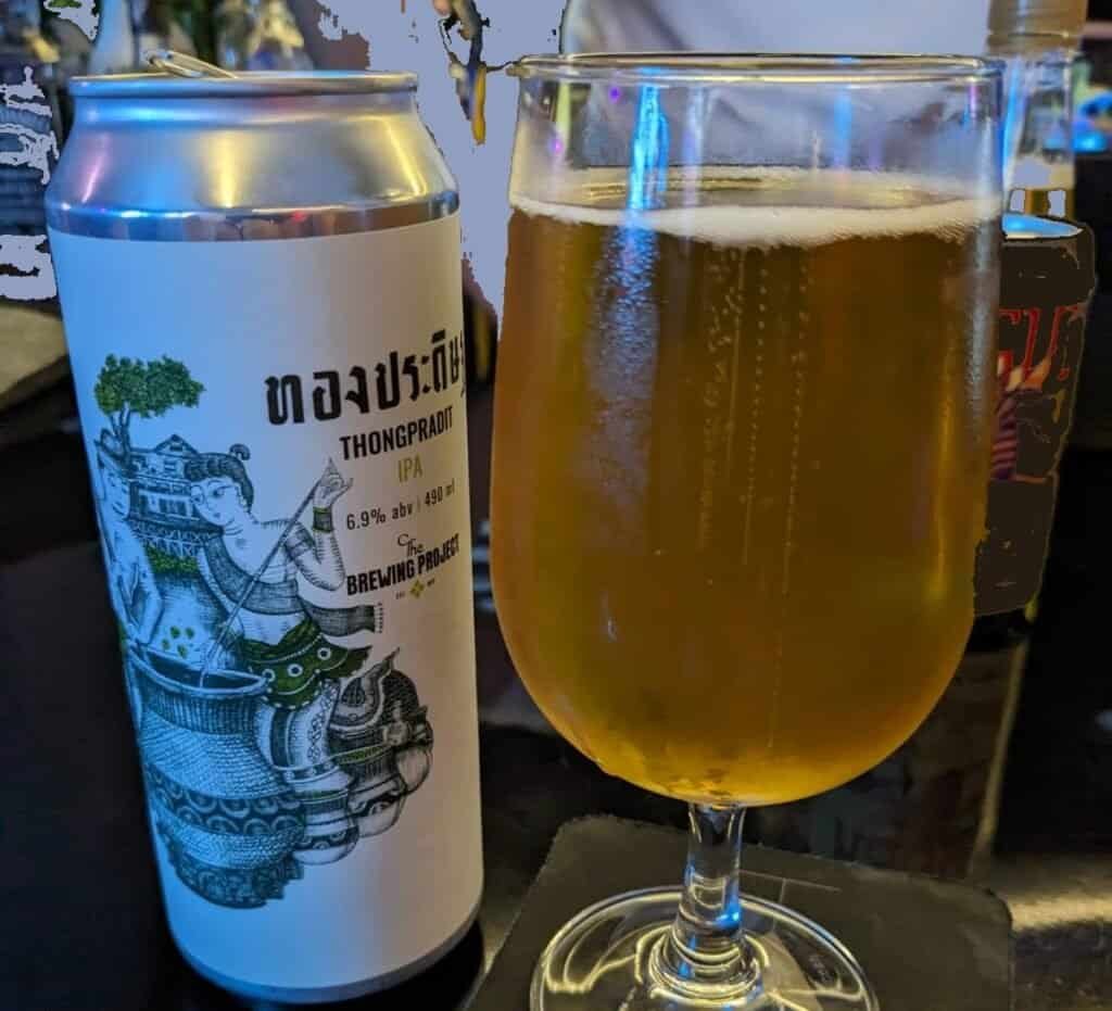 Brewing Project beer in a can poured in a glass, available throughout Bangkok and Thailand, Thongpradit IPA