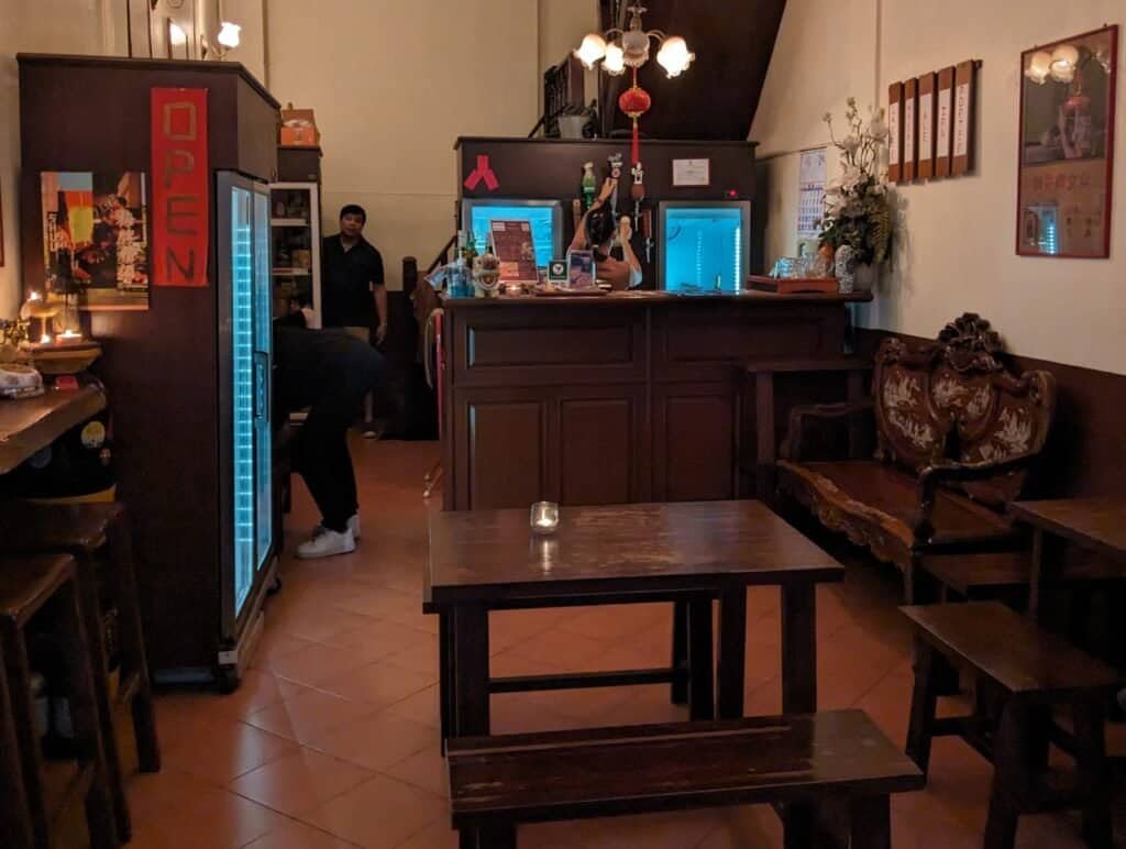 Inside seating at Pijiu craft beer bar in Bangkok Chinatown, Thailand. 