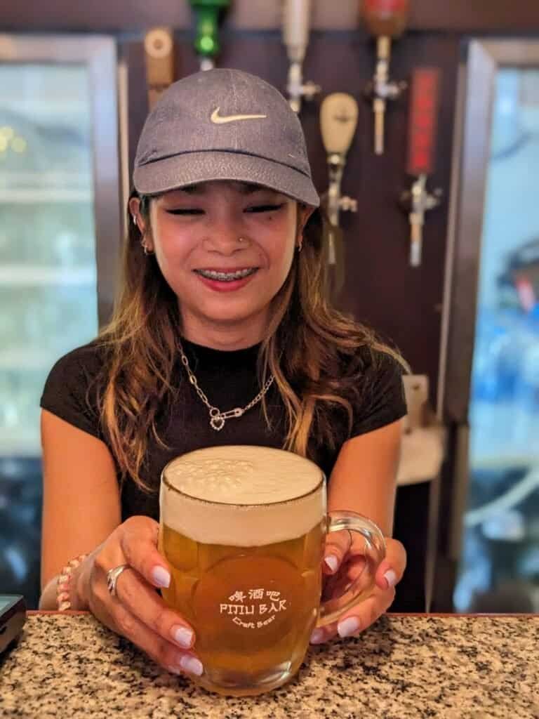 Schooner of beer served at Pijiu craft beer bar in Bangkok Chinatown, Thailand. 