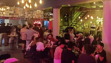 Crowd at Haze craft beer bar in Bangkok, Thailand.