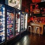 Hair of the Dog with the long row of craft beer fridges and bar, located in Bangkok Thailand