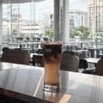 Brewave Ratchada branded glass on clean counter, Bangkok