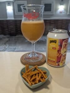 Beer ins a branded glass at FInger Heart in Silom, Bangkok