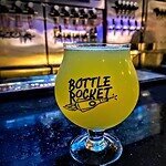 Bottle rocket branded glass and Thai craft beer