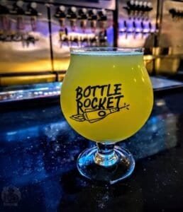 Bottle rocket branded glass and Thai craft beer