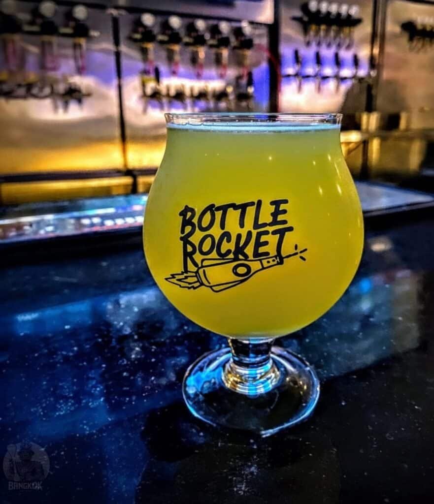 Bottle rocket branded glass and Thai craft beer