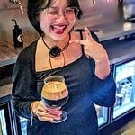 Serving a coffee stout at Hair of the Dog in Bangkok Thailand