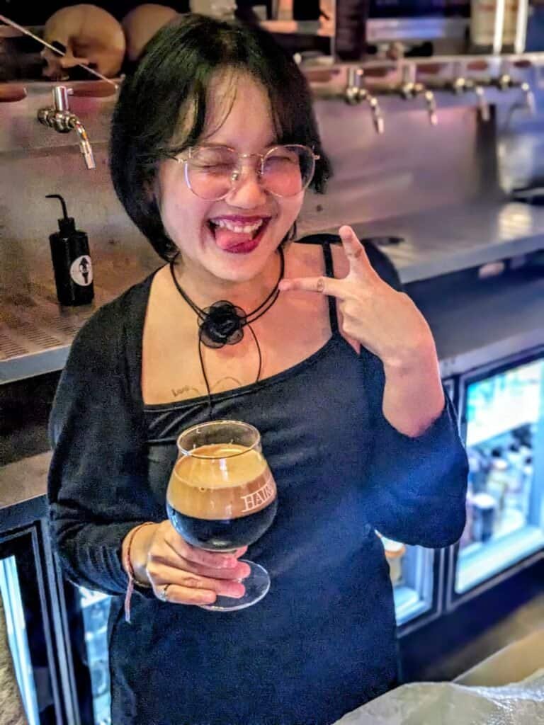 Serving a coffee stout at Hair of the Dog in Bangkok Thailand